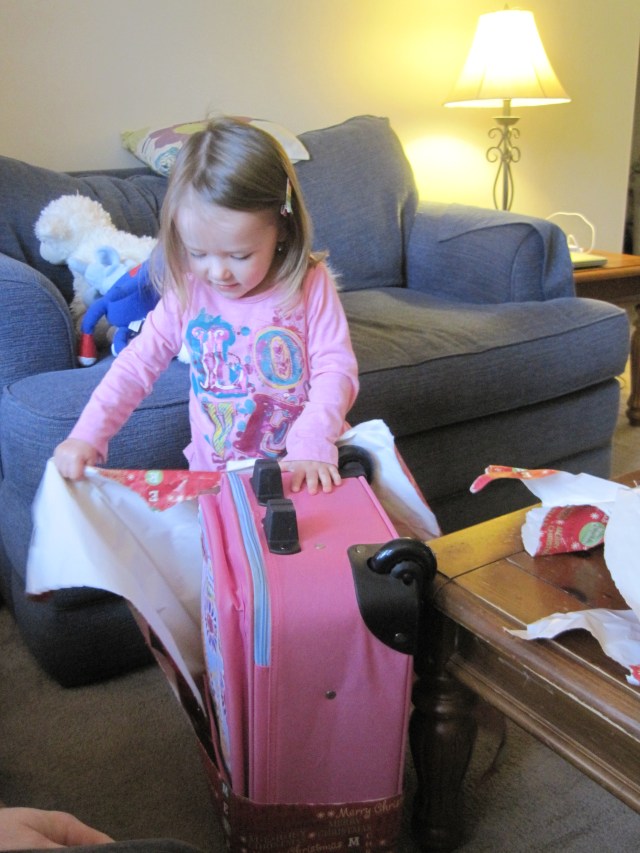 12-22-12 M opening suitcase