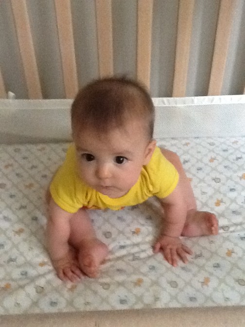 8-27-13 S sitting in crib